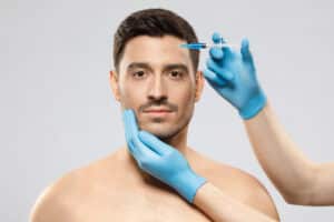 A man getting “Brotox” in his forehead