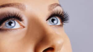 Close up of woman's long eyelashes after consistent Latisse use in Los Angeles, CA