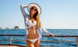 Woman in bikini after UltraShape body contouring treatment in Los Angeles, CA