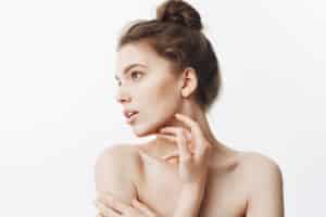 Woman showing her slim, contoured jawline after Kybella in Los Angeles, CA